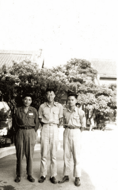 Master Sheng Yen (center) in military uniform with colleagues.