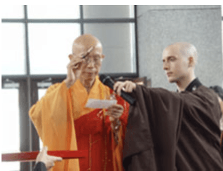 Master Sheng Yen performing the eye-opening ceremony for the Grand Buddha in the Buddha Hall on Dharma Drum Mountain in Taiwan.